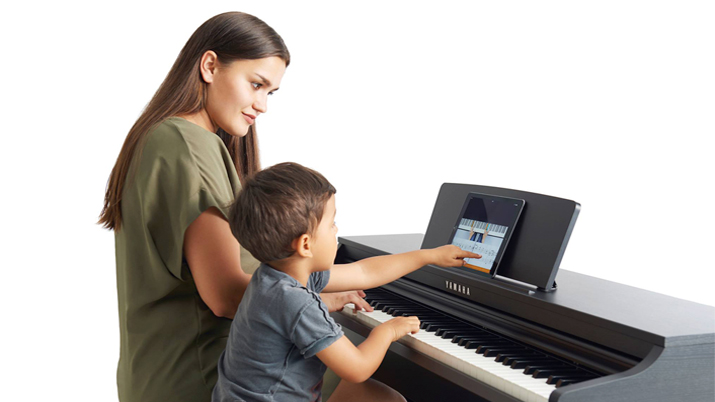 Aprende a tocar el piano con flowkey